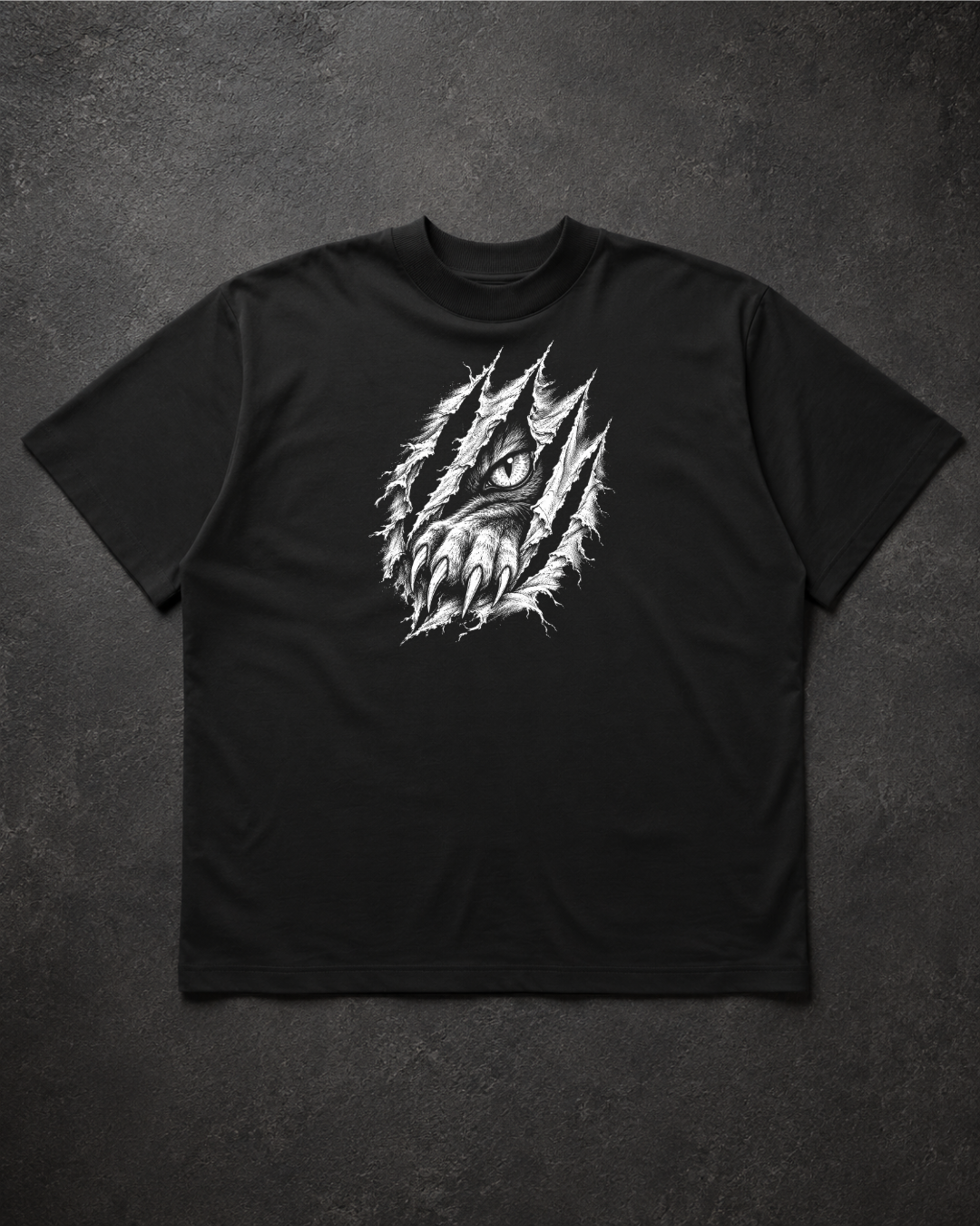 A black short-sleeve crewneck t-shirt featuring a white graphic print of a wolf's face emerging from a torn fabric effect on the chest, laid flat on a dark textured background.
