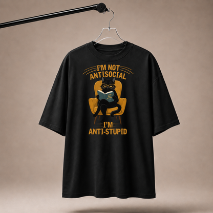 Black t-shirt with graphic design and text on a beige background
