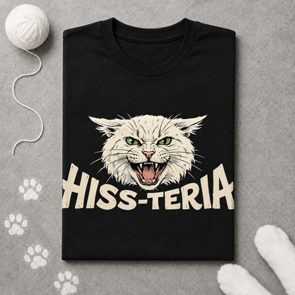 Black t-shirt with a graphic of a cat and 'HISS-TERIA' text on a gray surface with paw prints.