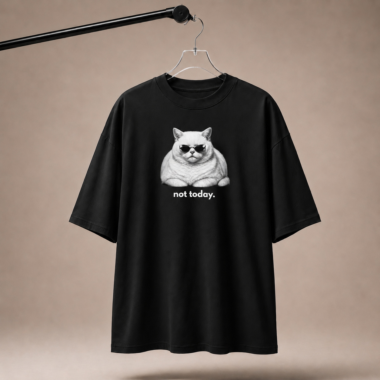 Black t-shirt with a cat graphic and 'not today.' text on a beige background