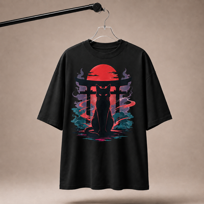 Black t-shirt with a graphic design of a cat and sunset on a beige background