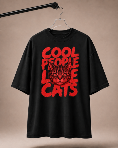 Black t-shirt with red cat graphic and text 'Cool people love cats' on a beige background