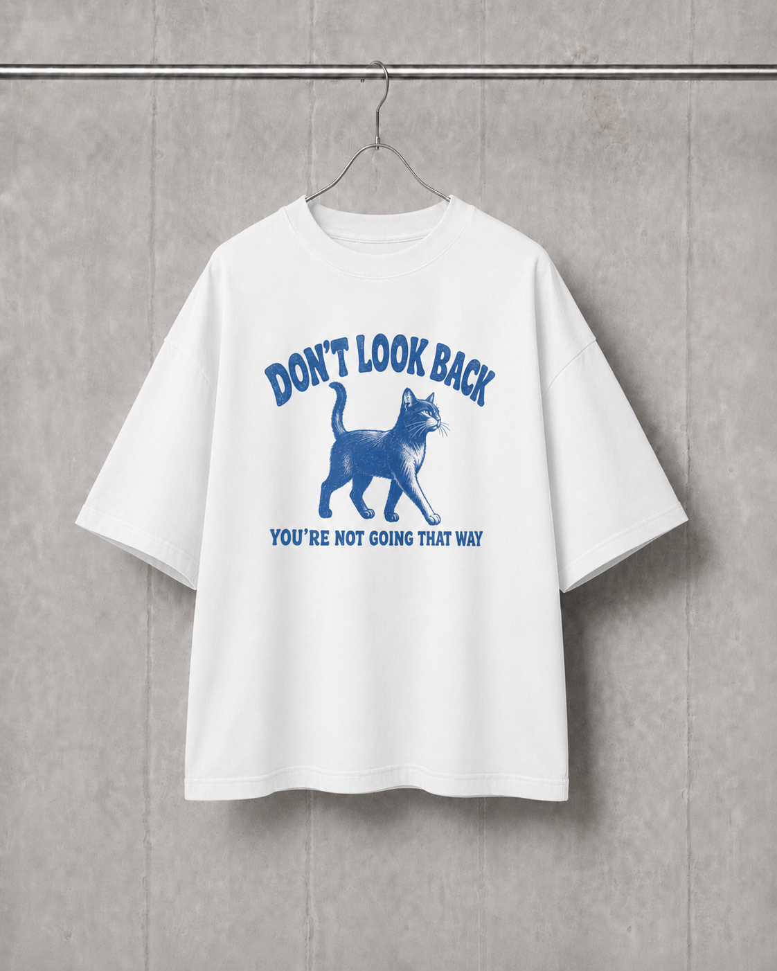 White t-shirt with blue graphic and text on a gray background