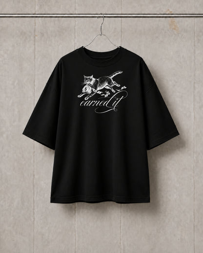 Black t-shirt with a white graphic design on a textured wall background