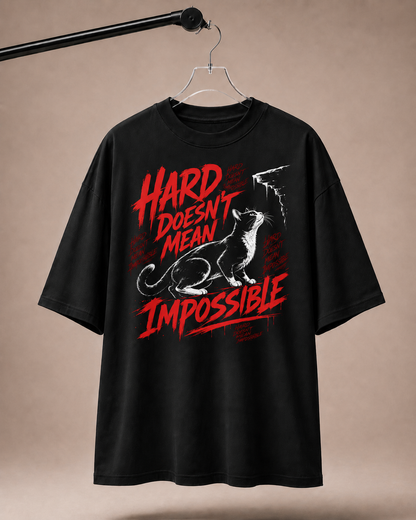 Black t-shirt with red and white graphic and text on a beige background