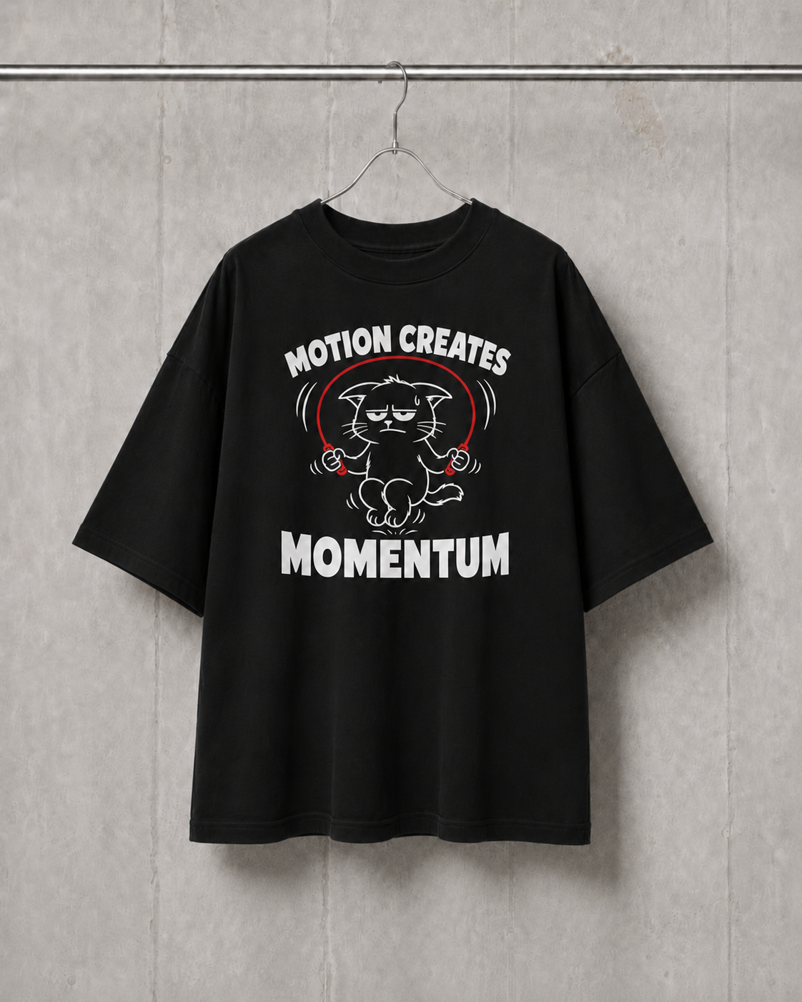 Black t-shirt with graphic design and text on a gray background