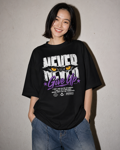 Person wearing a black t-shirt with graphic design and text against a plain background