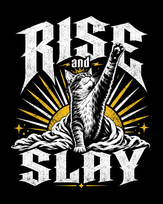 T-shirt design with a cat holding a paw up, 'Rise and Slay' text, and sunburst pattern on a black background.