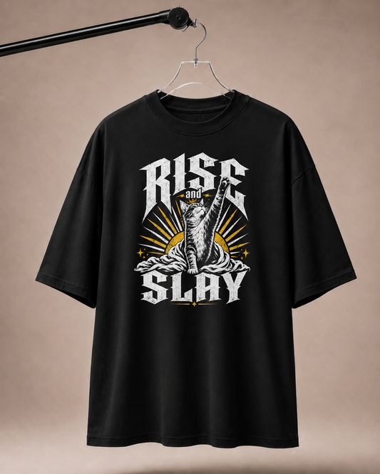 Black t-shirt with 'Rise and Slay' graphic design on a beige background