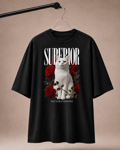 Black t-shirt with a white cat and red roses graphic on a beige background